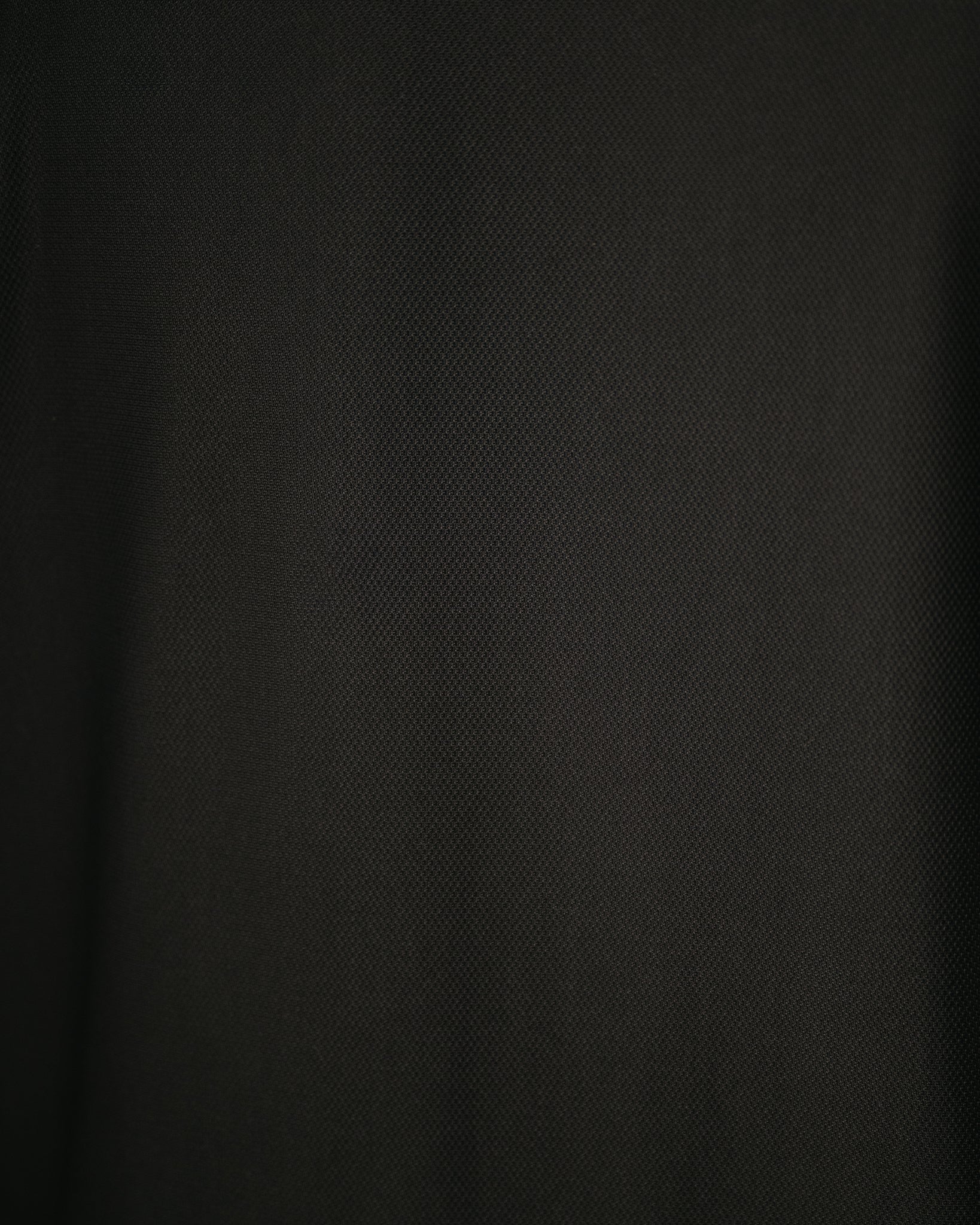 Solid black fabric texture